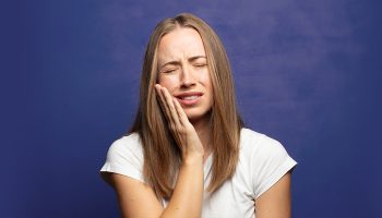 How to Sleep With a Toothache: Treatments and Tips for Instant Relief
